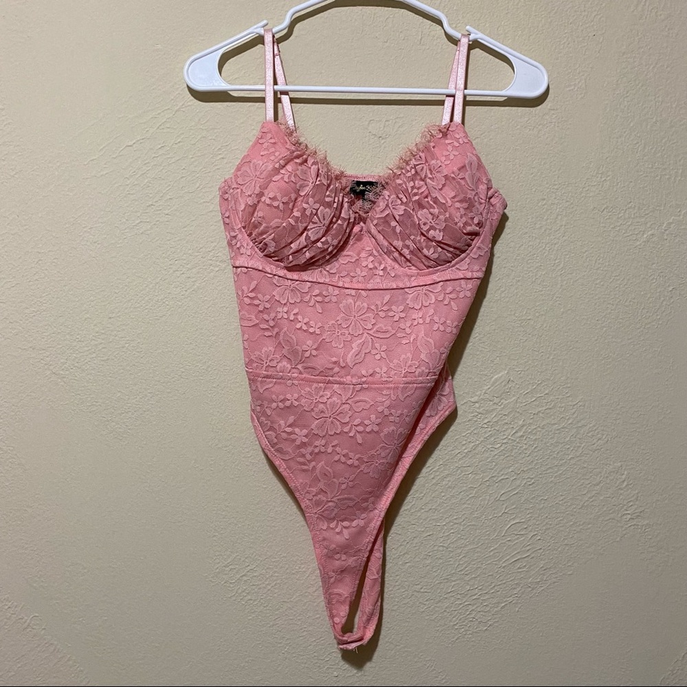 Pink body suit